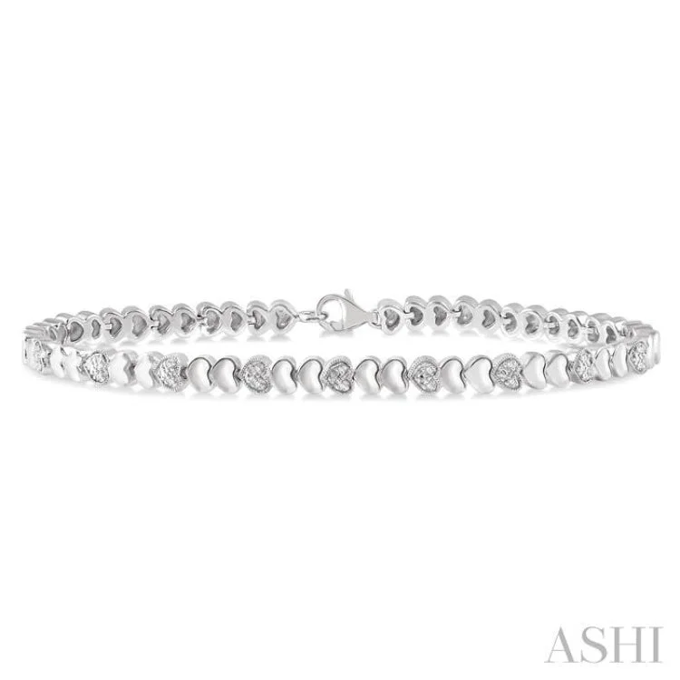 Elegant Chain Bracelets-1/6 Ctw Puffed Heart Plain and Round Cut Diamond Fashion Bracelet in Sterling Silver