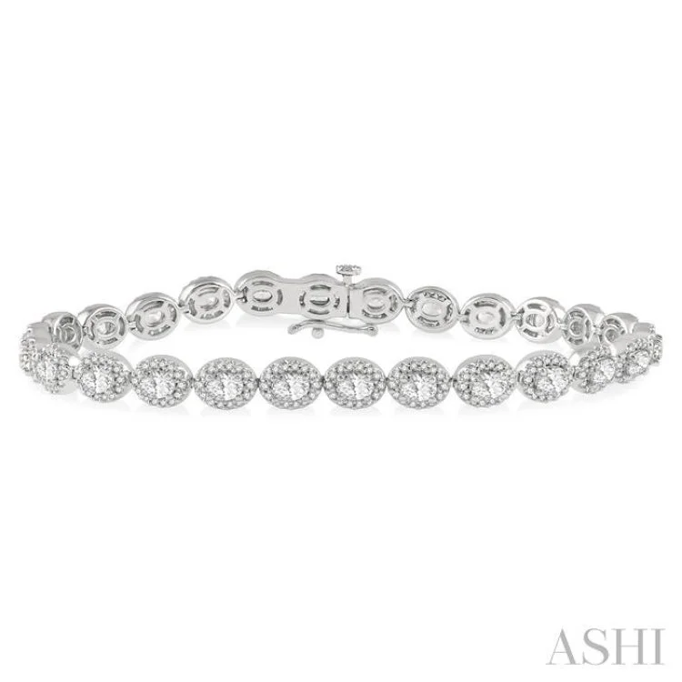 Designer Diamond Bracelets-5 Ctw Oval & Round Cut Diamond Halo Bracelet in 14K White Gold