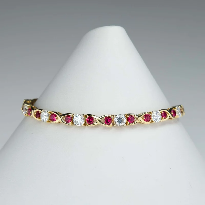 Elegant Gemstone Cuff Bracelets-Cubic Zirconia and Red Spinel "X"Link Tennis Bracelet is 14K Yellow Gold