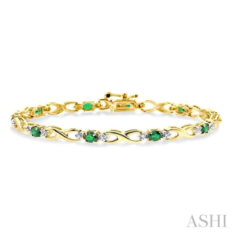 Silver Tennis Bracelets-4x3mm Oval Cut Emerald and 1/10 Ctw Single Cut Diamond Bracelet in 14K Yellow Gold