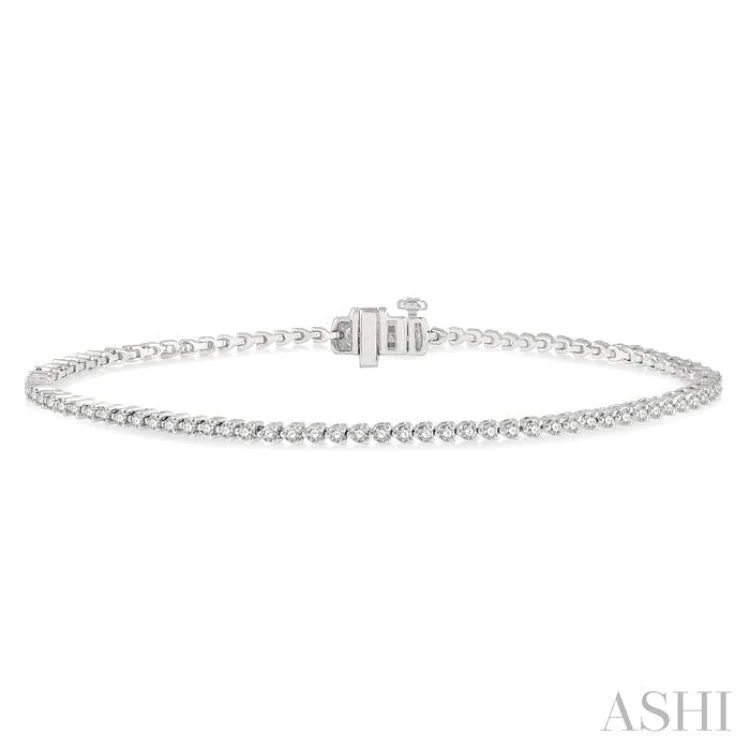 Pearl Charm Bracelets-1 Ctw Tri-Prong Round Cut Diamond Bracelet in 14K White Gold